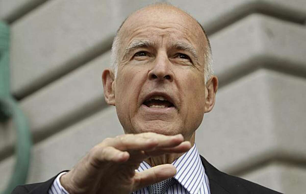 California Attorney General Jerry Brown, running for governor of California, explains his defense of a state law enforcement policy that allows police to collect DNA samples from people who have been arrested but not convicted of any crime Tuesday, July 13, 2010, outside the United States Court of Appeals courthouse in San Francisco.