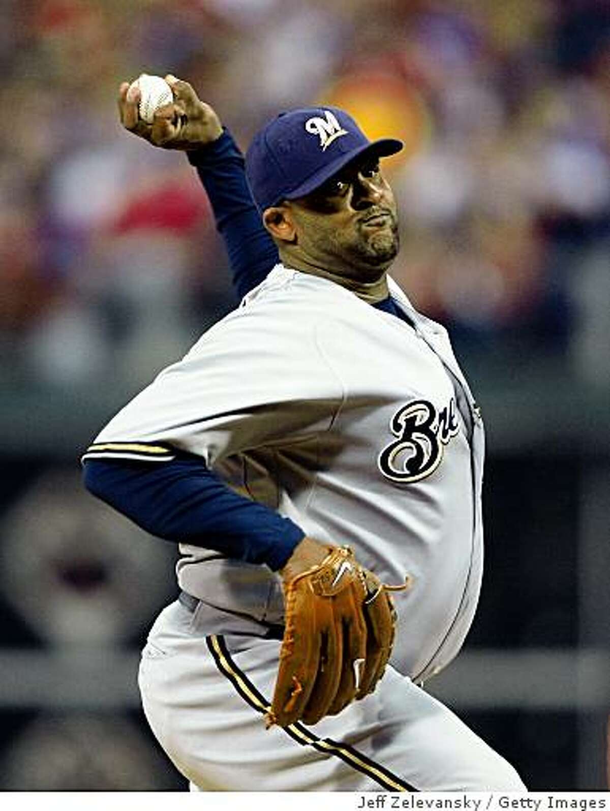 PHILADELPHIA - OCTOBER 02: CC Sabathia #52 of the Milwaukee Brewers delivers in Game 2 of the NLDS Playoff against the Philadelphia Phillies at Citizens Bank Ballpark on October 2, 2008 in Philadelphia, Pennsylvania. According to reports December 10, 2008, Sabathia is close to signing a seven-year deal with the New York Yankees worth 160 million dollars. (Photo by Jeff Zelevansky/Getty Images)
