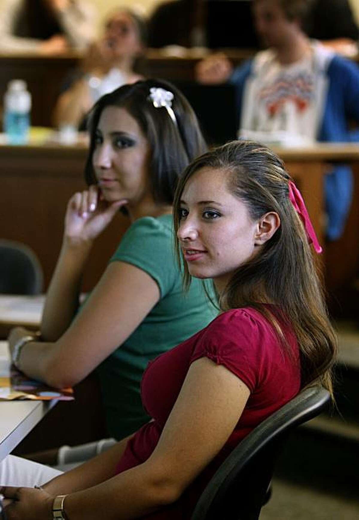 Cynthia Belez (left) and Rebeca Ponce attend a class on negotiation and conflict resolution at Cal in Berkeley, Calif., on Wednesday, June 30, 2010. Belez and Ponce are undergraduate students from Mexico taking summer classes at UC Berkeley, which has seen a spike in international students during the summer session.