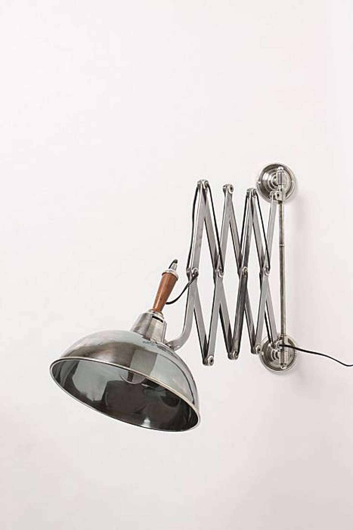 Scissor sconces salute steely industrial era
