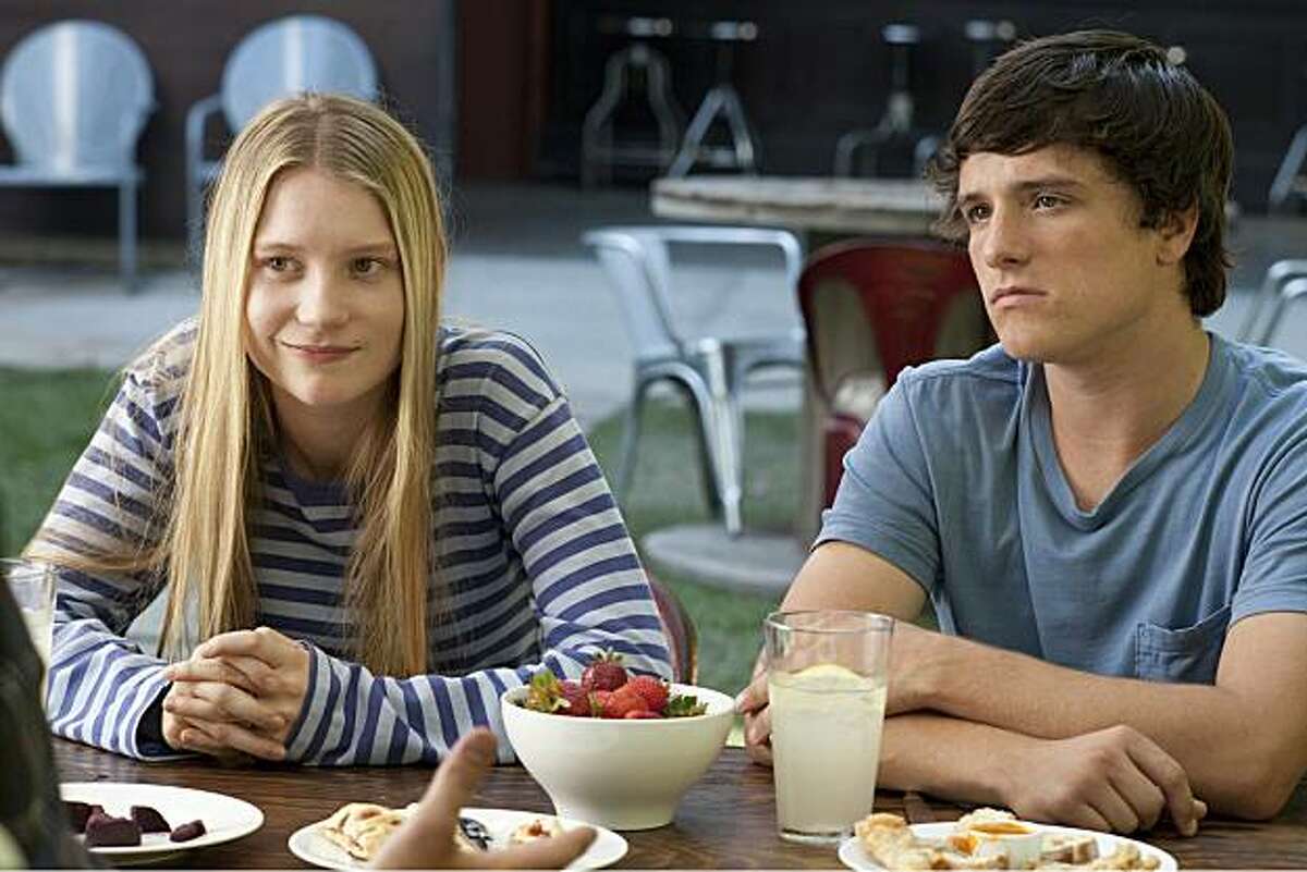 Mia Wasikowska (left) and Josh Hutcherson (right) star as Joni and Laser in Lisa Cholodenko?•s THE KIDS ARE ALL RIGHT, a Focus Features release.