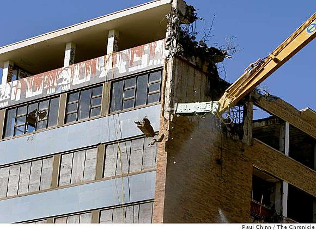 Work crews began demolishing the long-abandoned Public Health Service Hospital at the Presidio in San Francisco, Calif., on Thursday, Dec. 4, 2008.