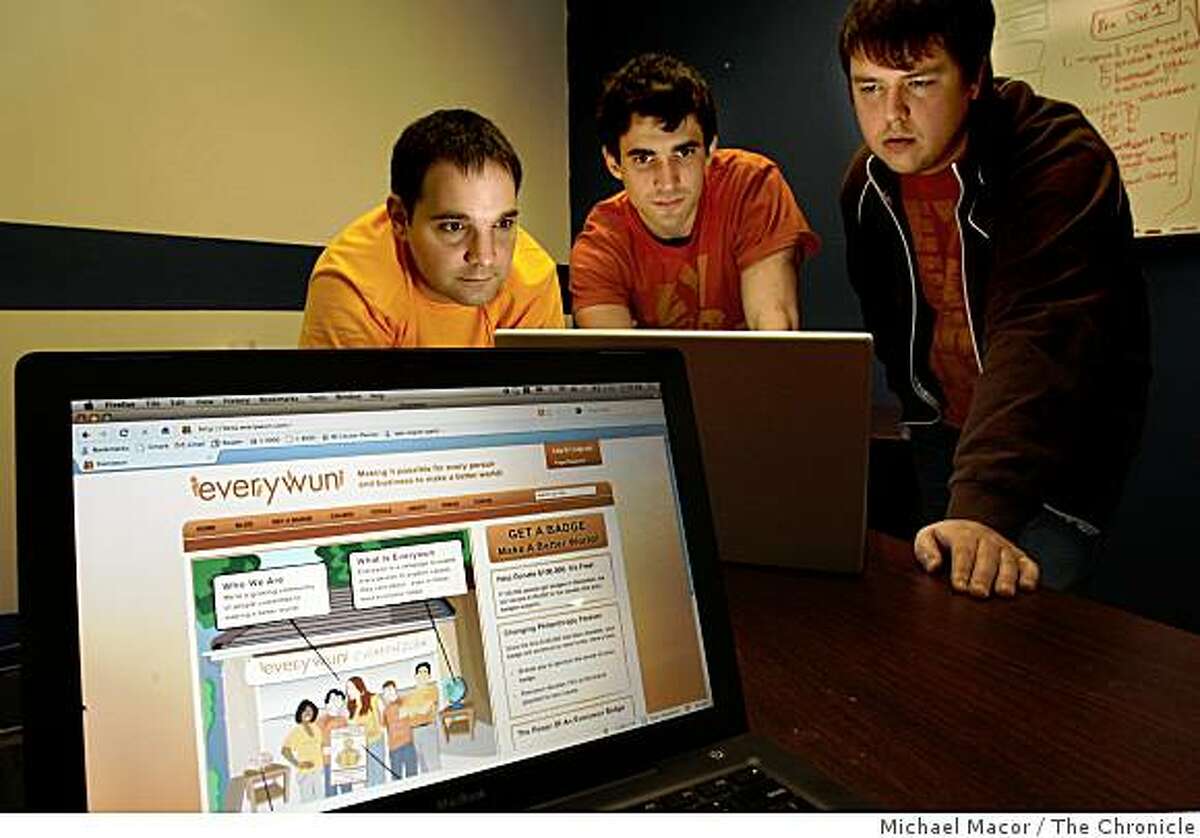 Joe Bergeron (left), chief technology officer, Dan Jacobs (center), founder and Chase Campbell (right), graphic designer are all part of the startup internet site, "everywun", at their offices in Palo Alto, Calif. on Tuesday Dec.. 2, 2008.