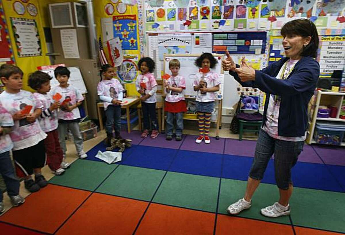 Kindergarten teacher Debbie Weissman prepares her class for recess at Thornhill Elementary School in Oakland, Calif., on Wednesday, June 9, 2010. If approved, a bill would restrict minimum age of enrollment in kindergarten classes to five-years-old.