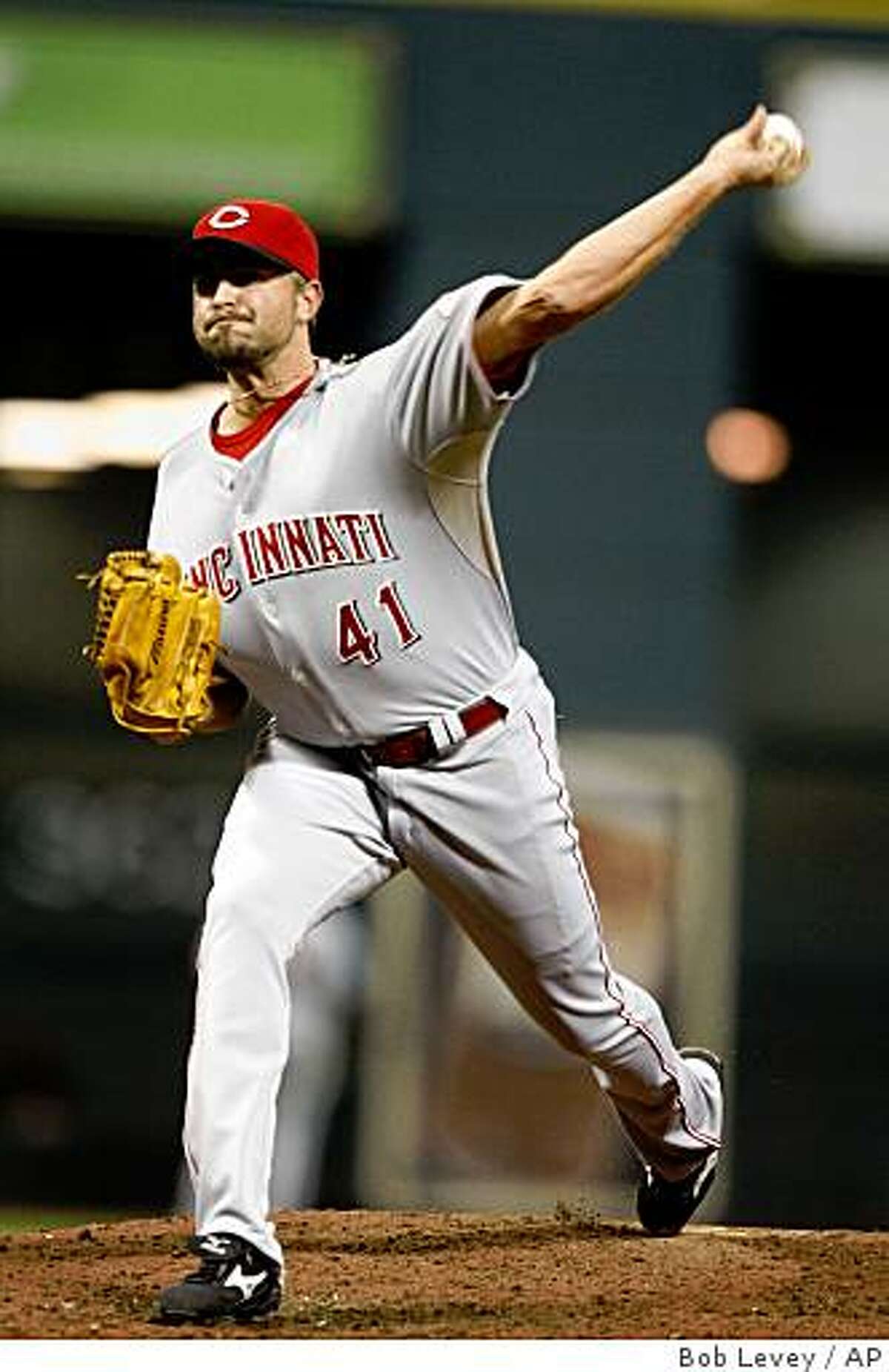 In this Sept. 24, 2008 file photo, Cincinnati Reds relief pitcher Jeremy Affeldt pitches in a game against the Houston Astros in Houston.