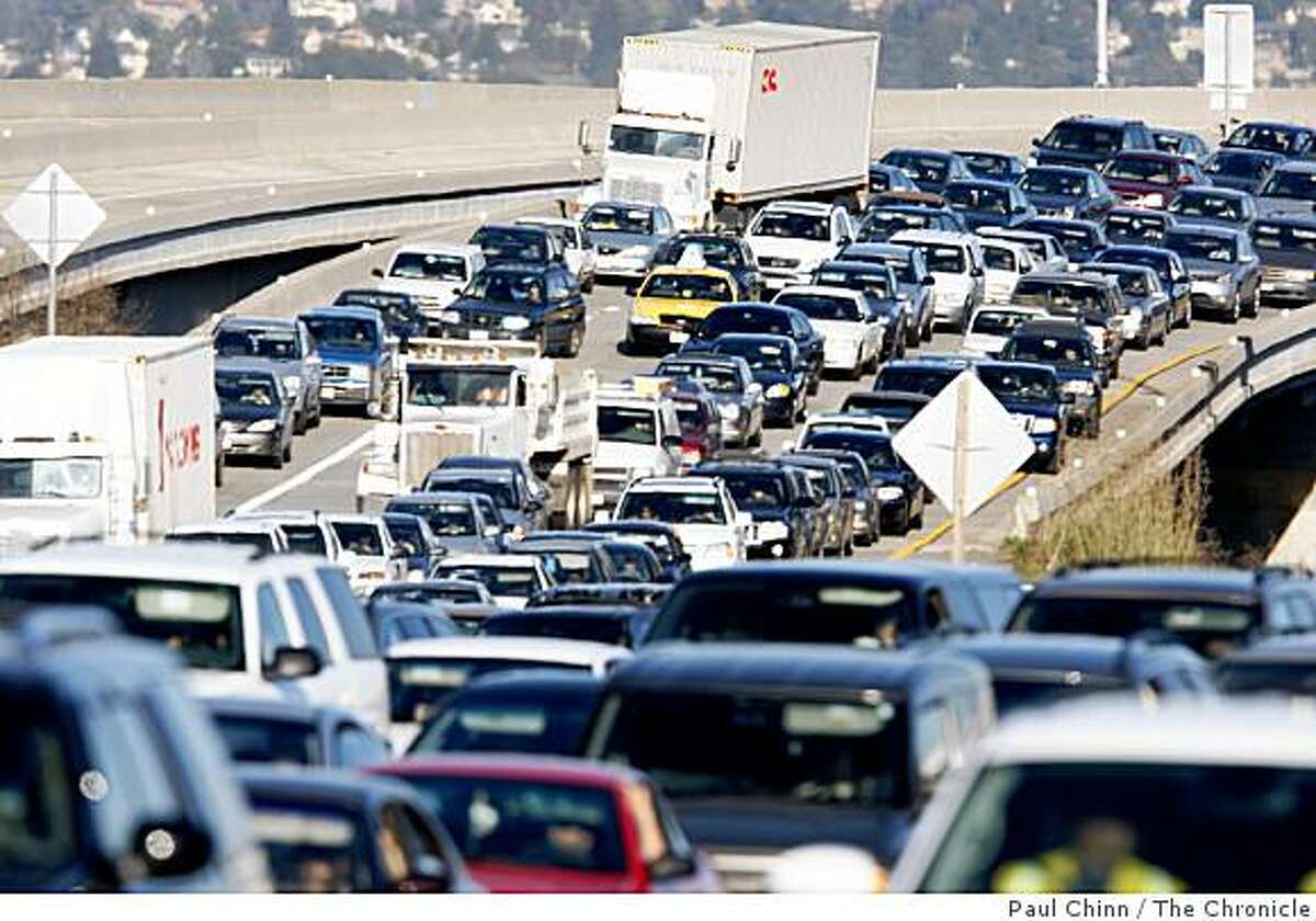 Westbound traffic inches towards the Bay Bridge toll plaza after a jackknifed big rig blocked several lanes of the incline section on the eastern span in Oakland, Calif., on Tuesday, March 4, 2008. The accident, which took about an hour to clear, backed up the afternoon commute for several miles in the East Bay.Photo by Paul Chinn / San Francisco Chronicle