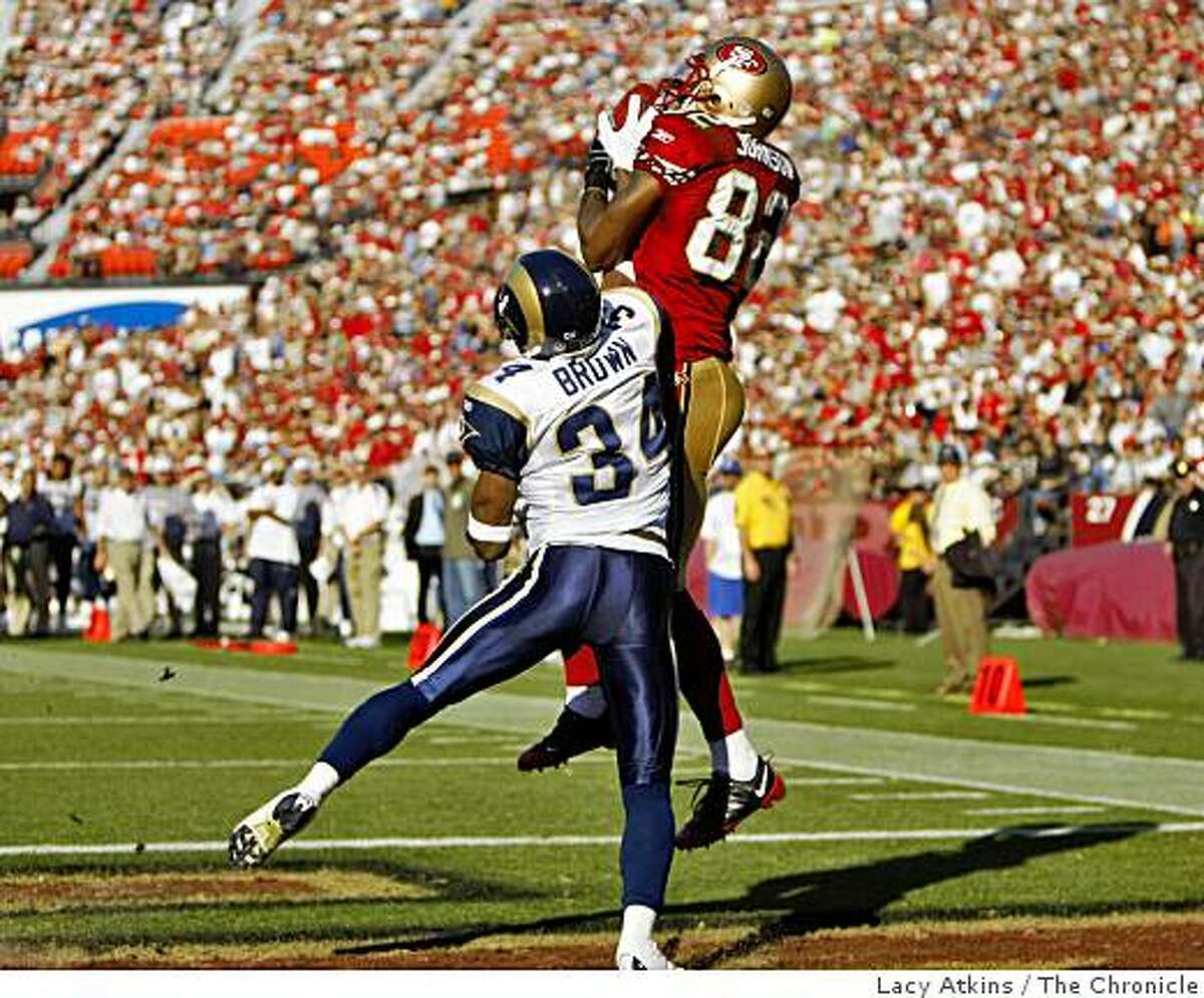 San Francisco 49ers Bryant Johnson catches a touchdown pass with Rams Fakhis Brown trying to stop him in the first half against the St. Louis Rams, Sunday Nov. 16, 2008, in SanFrancisco , Calif.