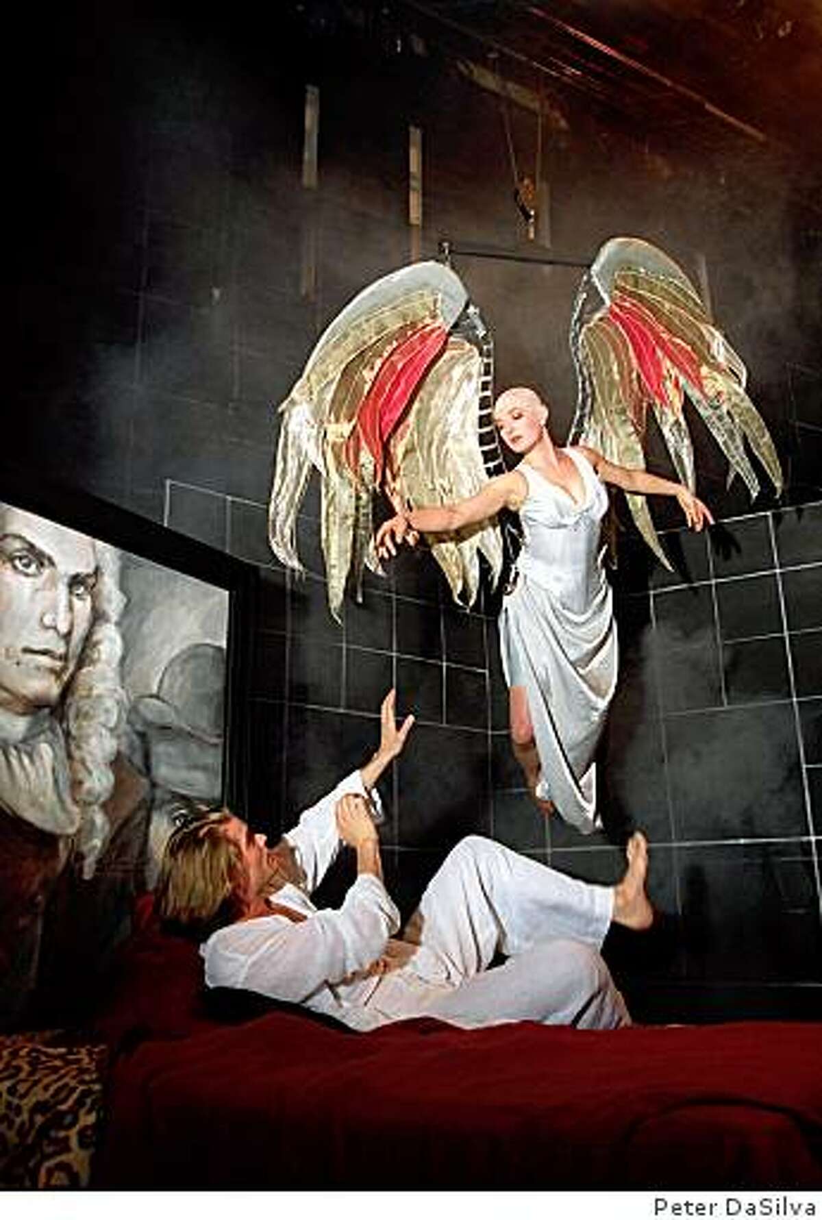 Actress Lise Bruneau as the angel, flys in over Garret Dillahunt, who plays Prior Walker, in the 1994 play "Angels in America"