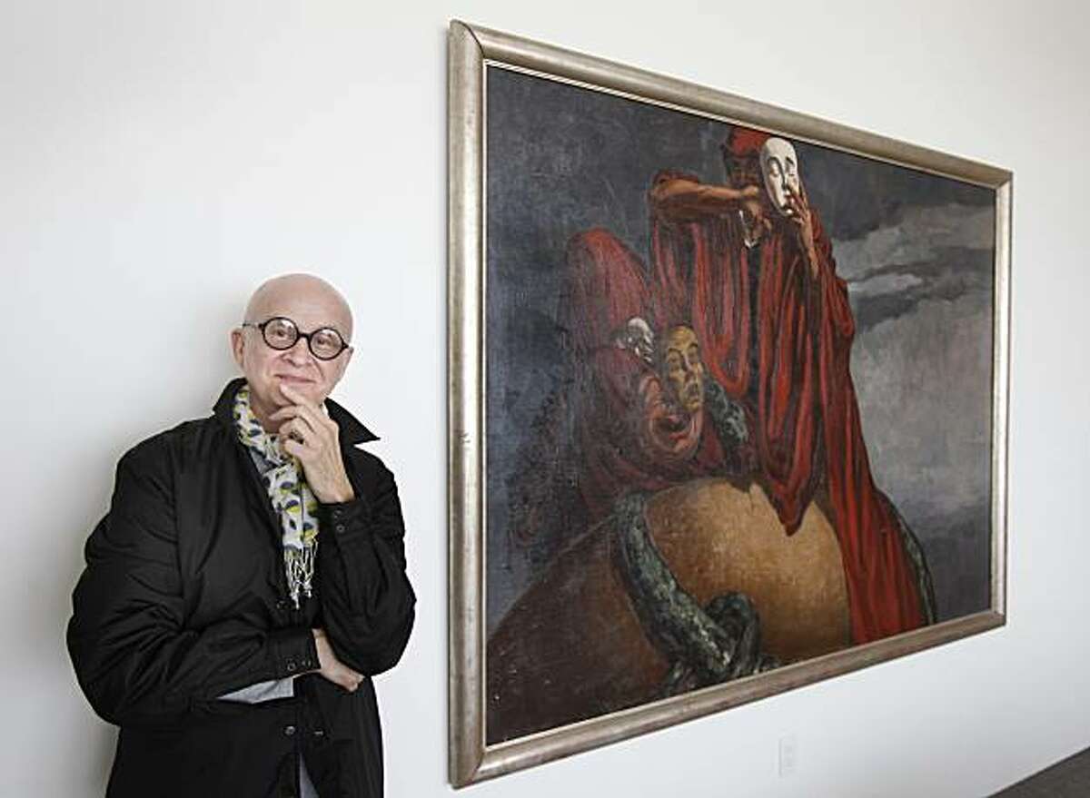 Orlando Diaz-Azcuy stands next to one of his favorite paintings, "Masques" by Jose Maria Sert.