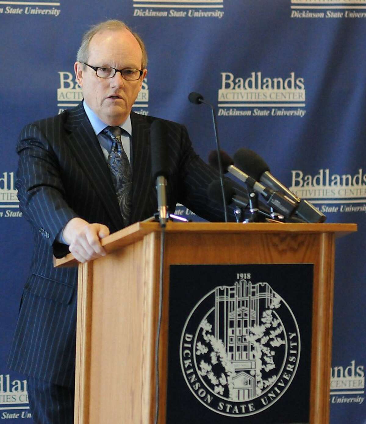 Dickinson State University President D.C. Coston speaks on Friday, Feb. 10, 2012, at the Badlands Activities Center in Dickinson, N.D. According to an audit report, the university awarded hundreds of degrees to foreign students who did not earn them.