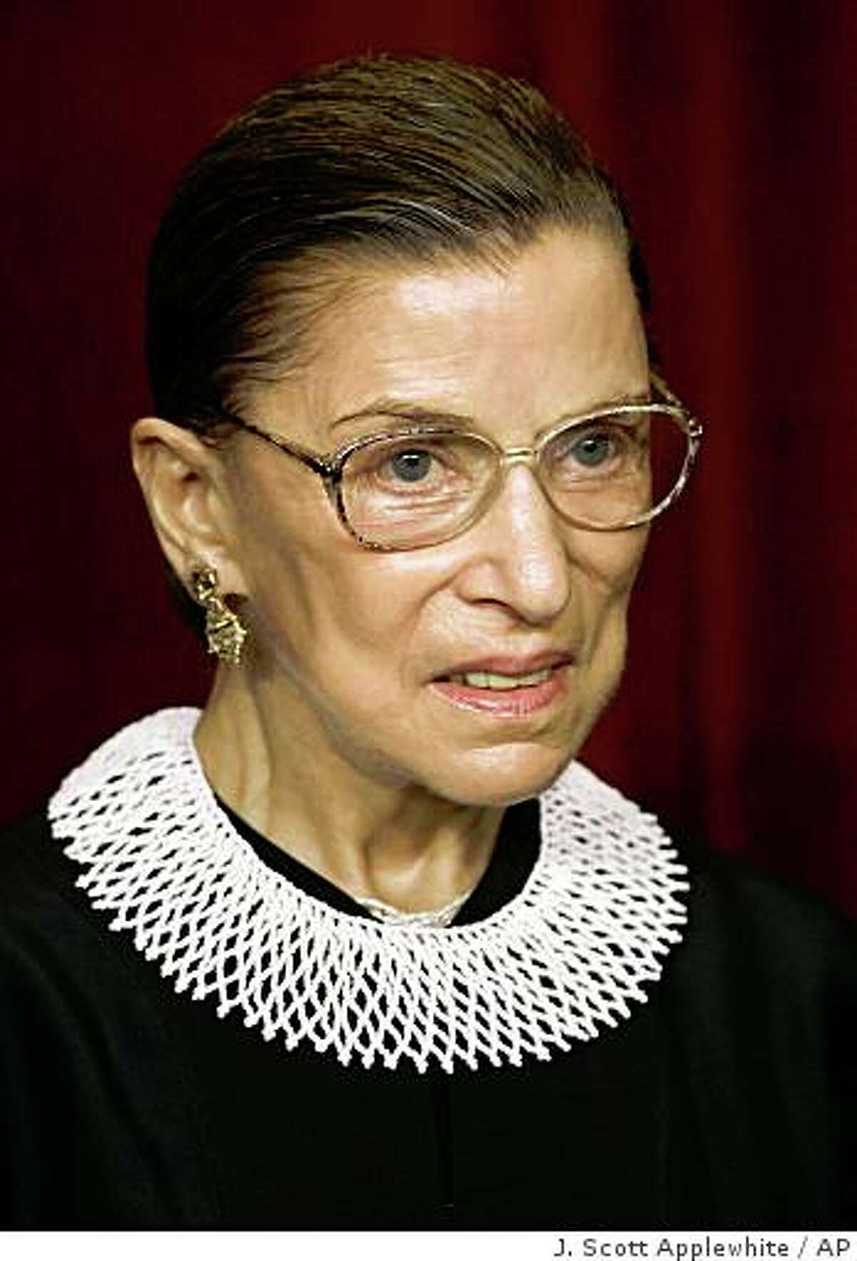 Associate Justice Ruth Bader Ginsburg joins the members of the Supreme Court for photos during a group portrait session, at the Supreme Court Building in Washington, Friday, March 3, 2006.. President Clinton nominated her as an Associate Justice of the Supreme Court, and she took her seat Aug. 10, 1993. (AP Photo/J. Scott Applewhite)Ran on: 03-19-2006