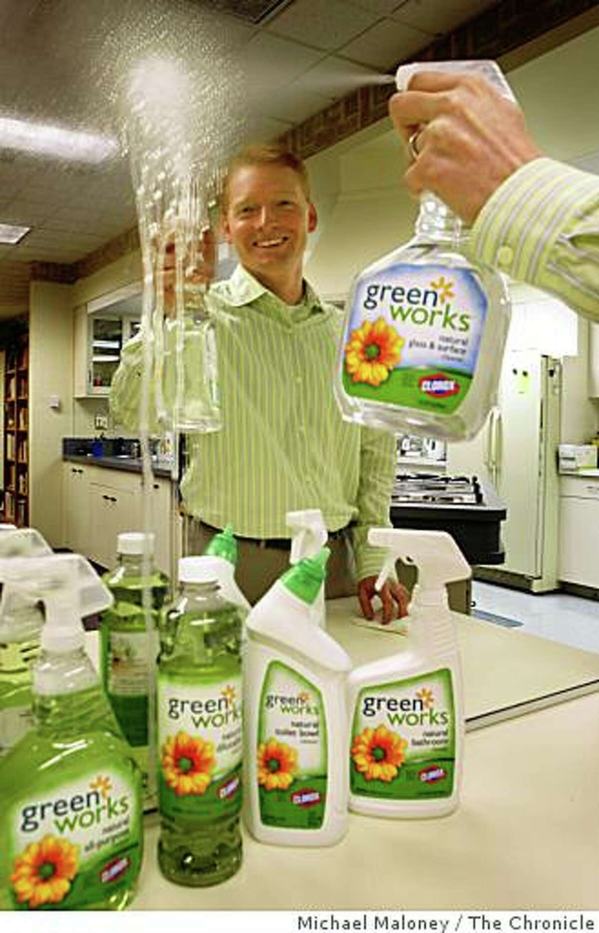 Matt Kohler, brand manager for the Green Works line of products at Clorox demonstrates one of the Green Works products in the Clorox test kitchen in Pleasanton, CA on Thursday, January 1, 2008. Clorox has introduced a line of environmentally-friendly household cleaning products called Green Works, made with natural, biodegradable, non-petroleum-based ingredients. Photo by Michael Maloney / The Chronicle