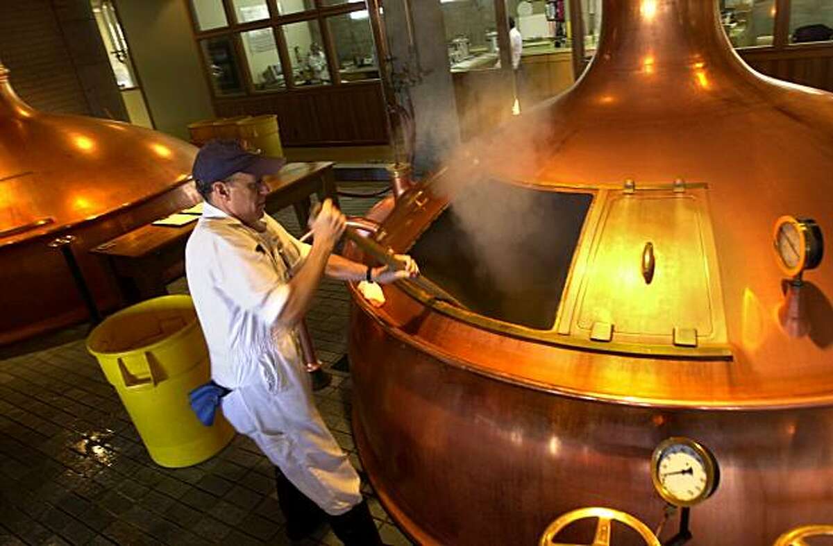 Ollie Lagomarsino works at the Anchor Brewing Co. in San Francisco, which Fritz Maytag has sold. Photo of CRAIG LEE / The Chronicle