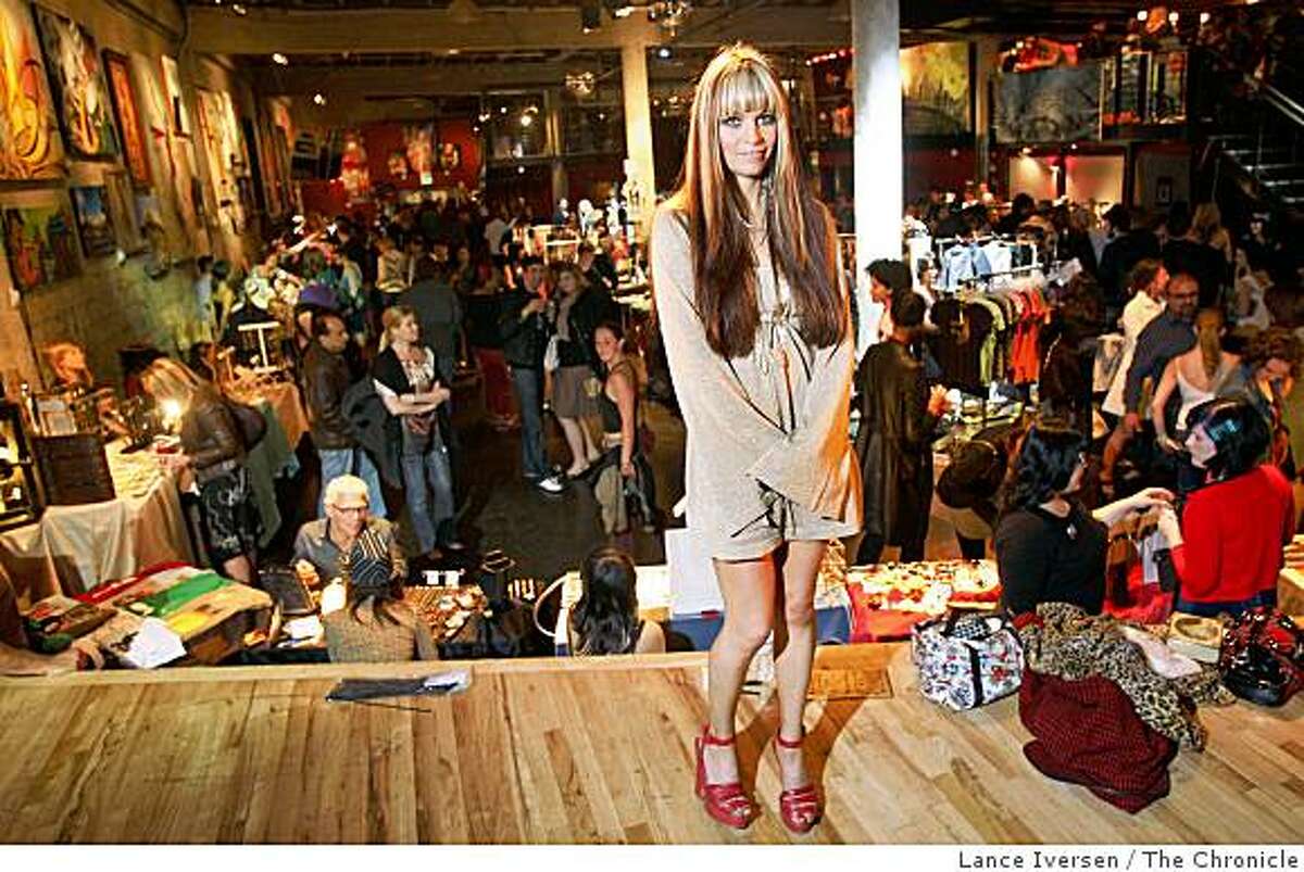 "Chillin" founder Irene Hernandez-Feiks poses for a photo among her guests. The tenth annual hipster art-fashion-networking party called "Chillin' " took place at the Mezzanine Night club, at 444 Jessie Street in San Francisco, Calif, Saturday May 10, 2008. By Lance Iversen / San Francisco Chronicle.