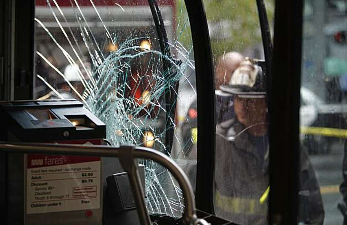 The shattered windshield of a 14 Mission MUNI bus after it collided with a pedestrian in the East bound lanes of Mission Street just East of Beale Street in the financial district of San Francisco, Calif. on Wednesday Apr. 21, 2010.