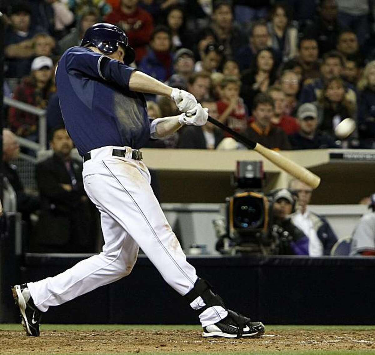 San Diego Padres' Chase Headley connects for a three run homer in the bottom of the ninth inning to give the Padres a 6-3 victory over the Arizona Diamondbacks in a baseball game Friday April 16, 2010 in San Diego.