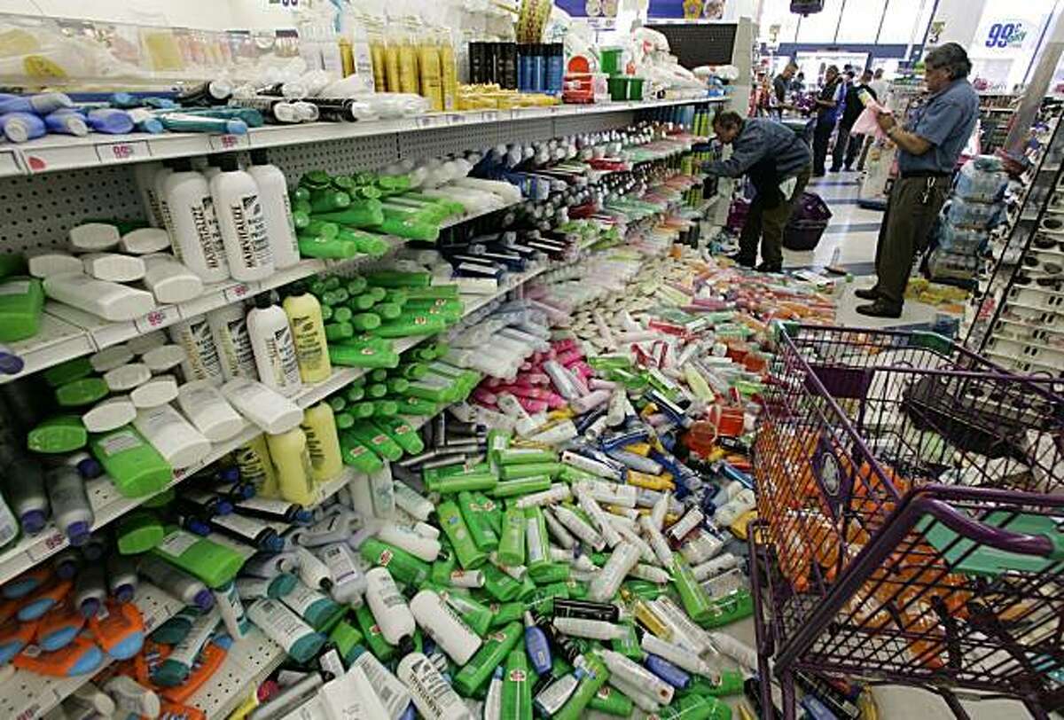 Piles of shampoo bottles lie in the aisle at a 99 cent store in Calexico, Calif. on Monday, April 5, 2010 after being shaken from the shelves in Sunday's earthquake. The manager of the store opened as early as possible to help local residents get essentials like water, canned goods and soap.