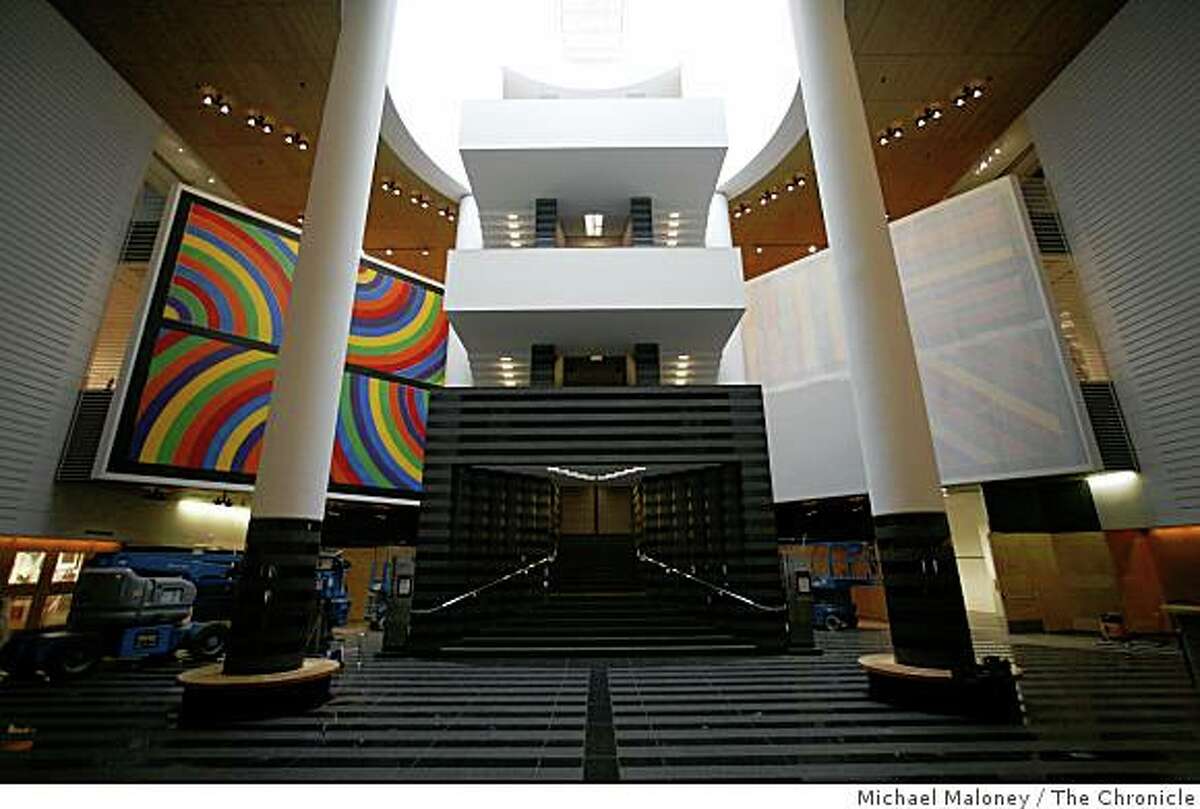 Wall paintings by Sol LeWitt at SF MOMA are painted over to make room for another art installation. Since 2000, the multi-colored murals have been prominently displayed in the lobby atrium, on either side of the main starway to the galleries. The painting on the right has already been painted over in this photo taken in San Francisco, Calif., on Sept. 17, 2008.