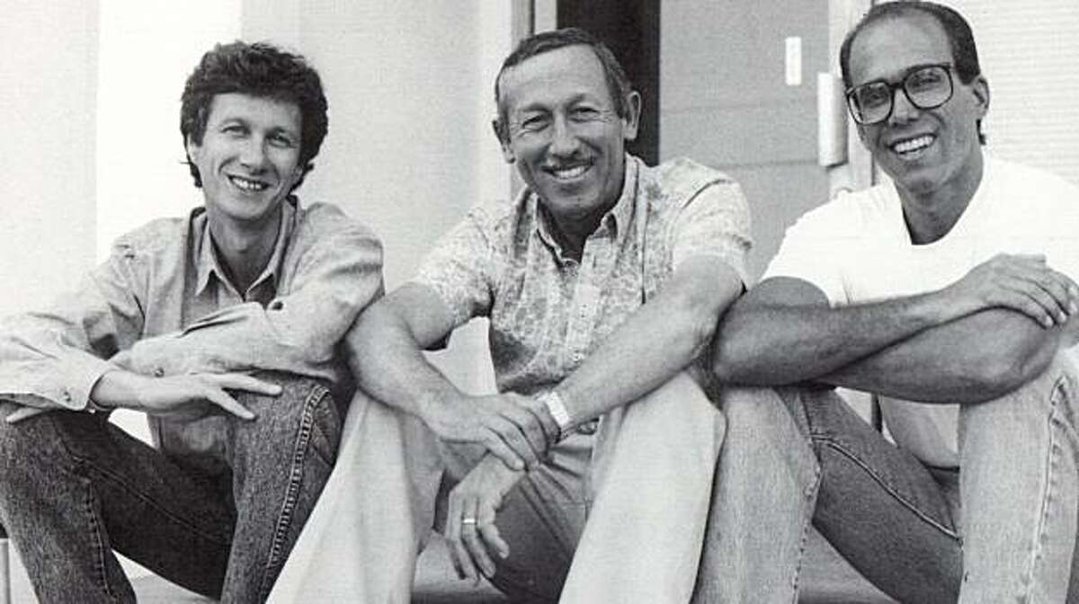 In this publicity image released by Disney, from left, Peter Schneider, Roy Disney and Jeffrey Katzenberg take a break from a story retreat in in a photo from the documentary, "Waking Sleeping Beauty."