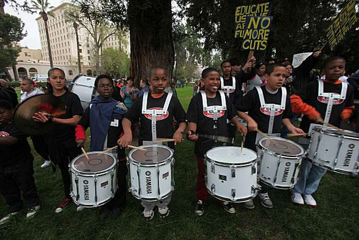 Students from the Conservatory of Vocal and Instrumental Arts (COVA) in Oakland join students from state and community colleges statewide in a rally at the state capitol in Sacramento, Calif., on Monday, March 22, 2010.