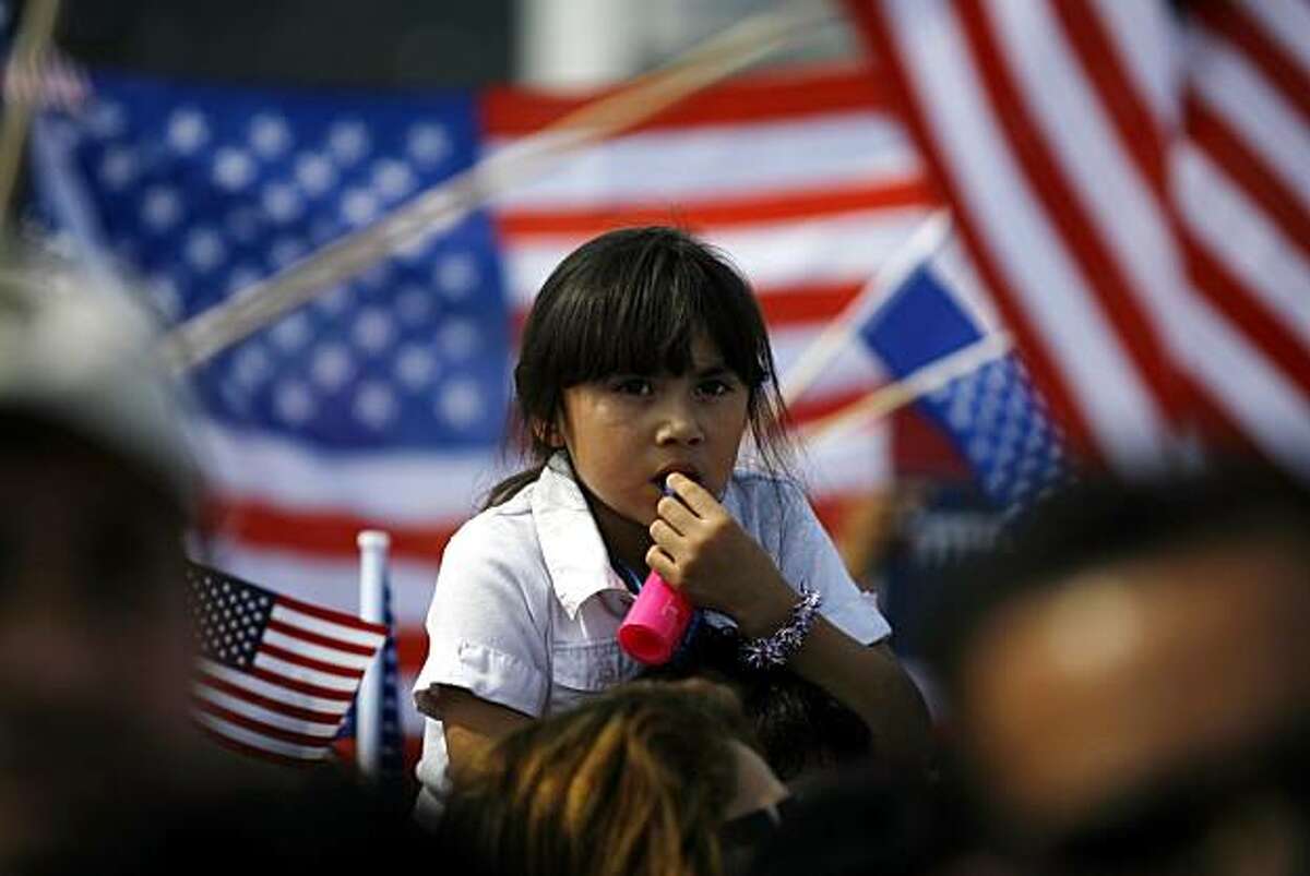 Jennifer Sanchez, 6, of D.C. attends a rally for immigration reform with her parents on the National Mall in Washington, on Sunday, March 21, 2010.
