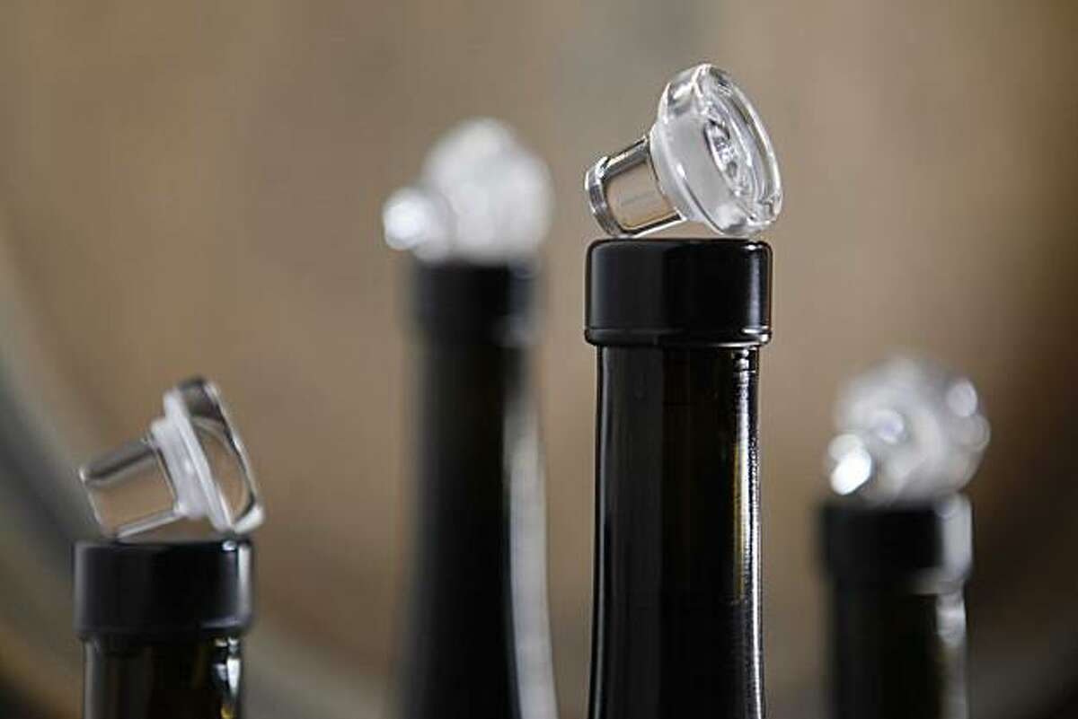A grouping of wines from Robert Sinskey Vineyards use a Vino-Lok closure, made from glass, instead of a traditional cork on Tuesday March 9, 2010 in Napa, Calif.