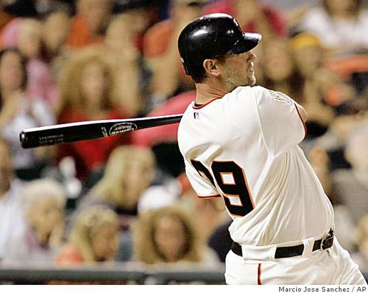 San Francisco Giants' Scott McClain hits a two-run home run off Pittsburgh Pirates relief pitcher John Grabow in the seventh inning of a baseball game in San Francisco, Saturday, Sept. 6, 2008. (AP Photo/Marcio Jose Sanchez)