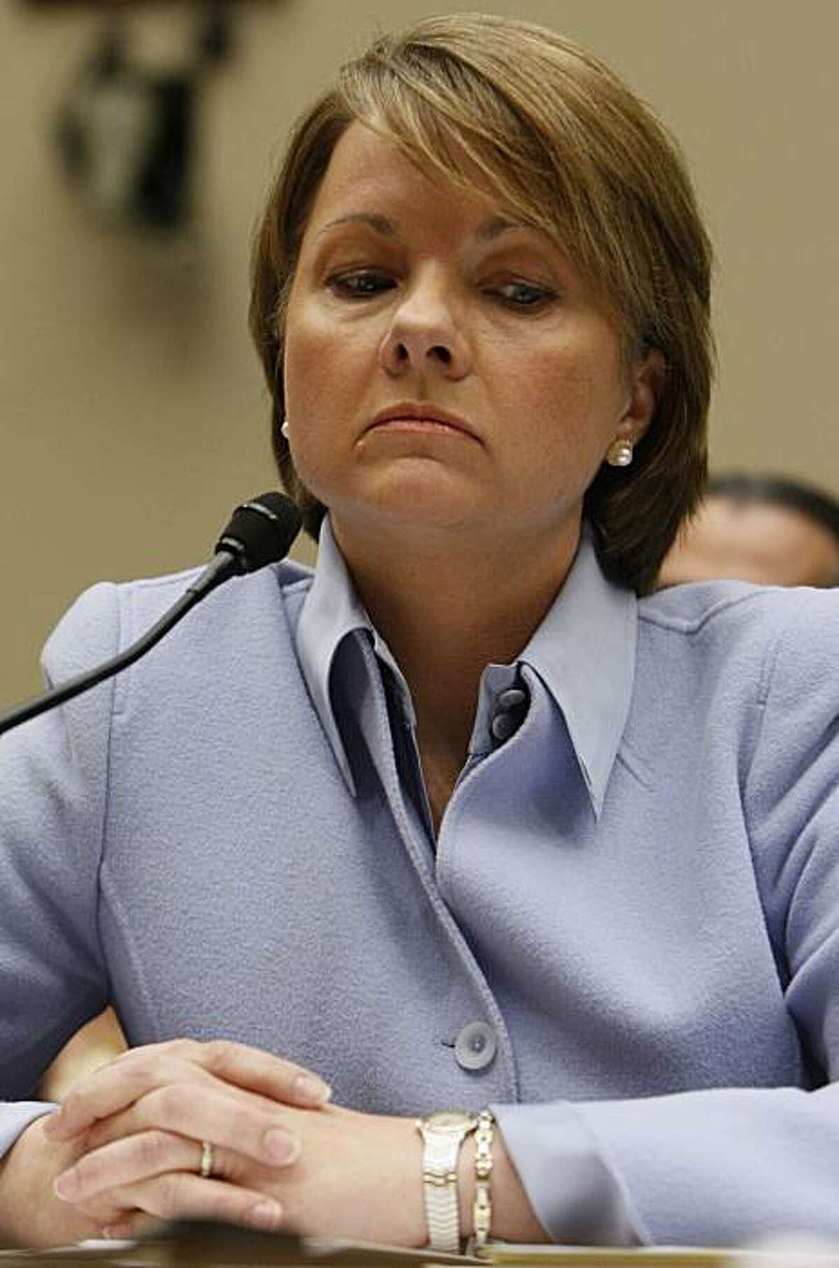 CORRECTS LAST NAME OF CEO ** Angela Braly, president and chief executive officer of WellPoint, Inc., testifies on Capitol Hill in Washington, Wednesday, Feb. 24, 2010, before the House Oversight and Investigations subcommittee hearing on "Premium Increases by Anthem Blue Cross in the Individual Health Insurance Market."