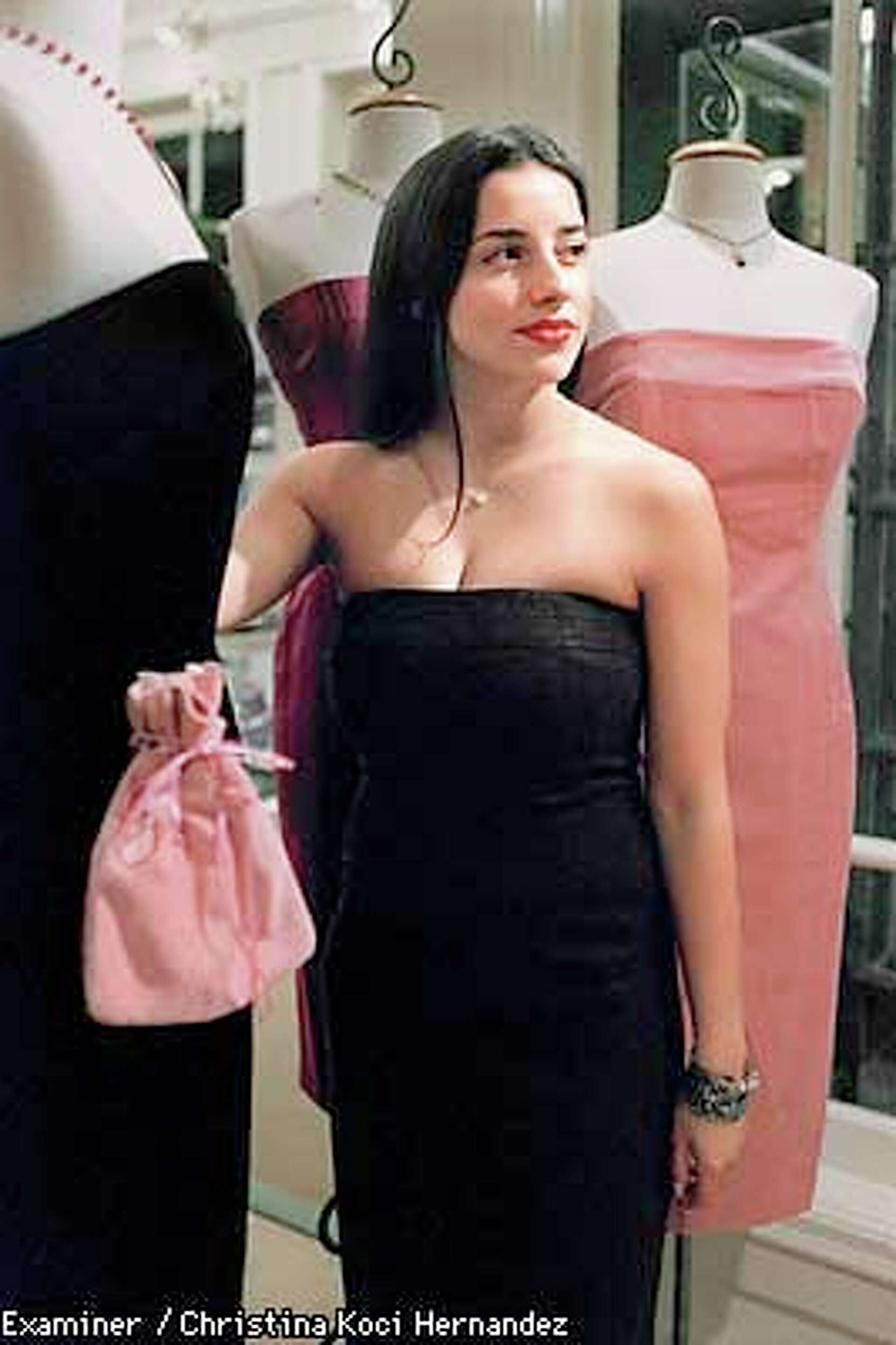 Dressing up, in her own designs