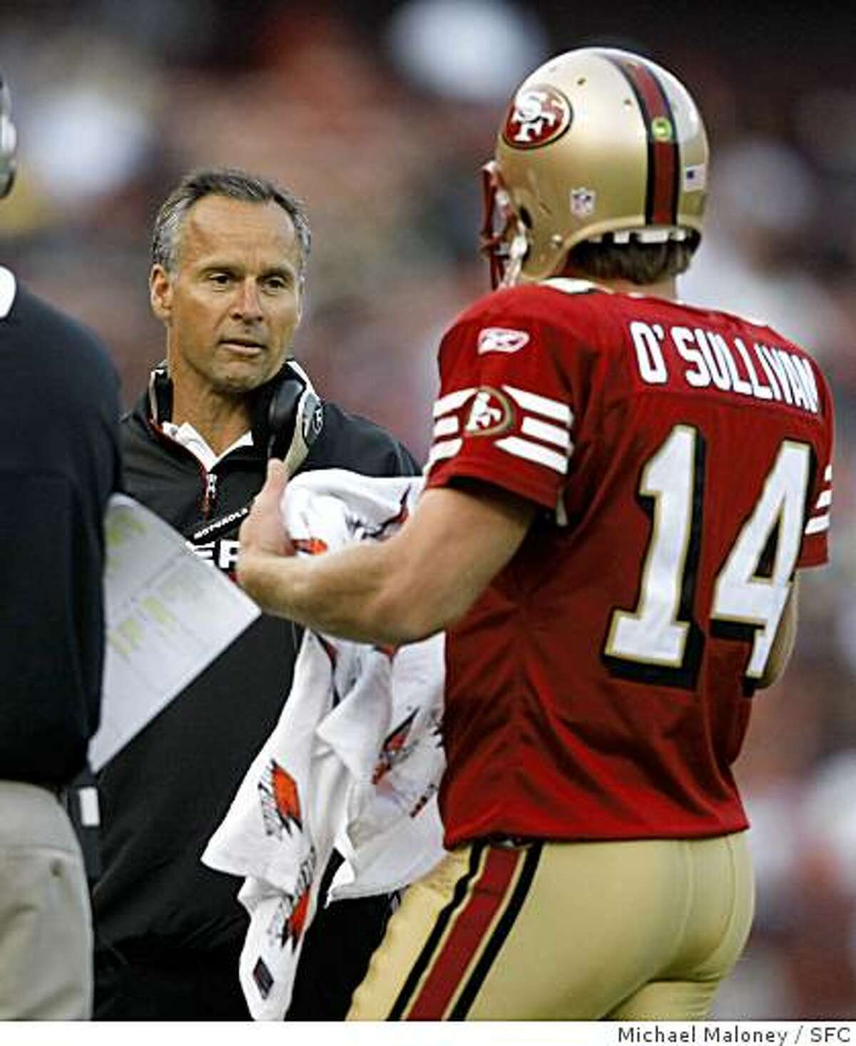 San Francisco 49ers head coach Mike Nolan talks to quarterback J.T. O'Sullivan during a 2nd quarter time out.The San Francisco 49ers host the Green Bay Packers in an NFL preseason game at Candlestick Park in San Francisco, Calif., on August 16, 2008.