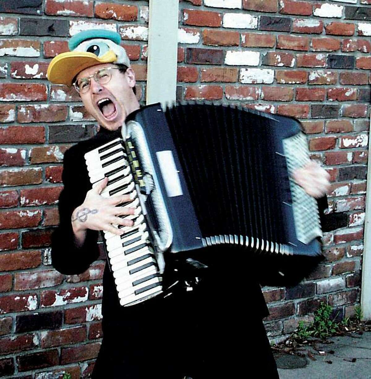 Oakland musician Duckmandu plays accordian versions of songs by the like of AC/DC and the Dead Kennedys.