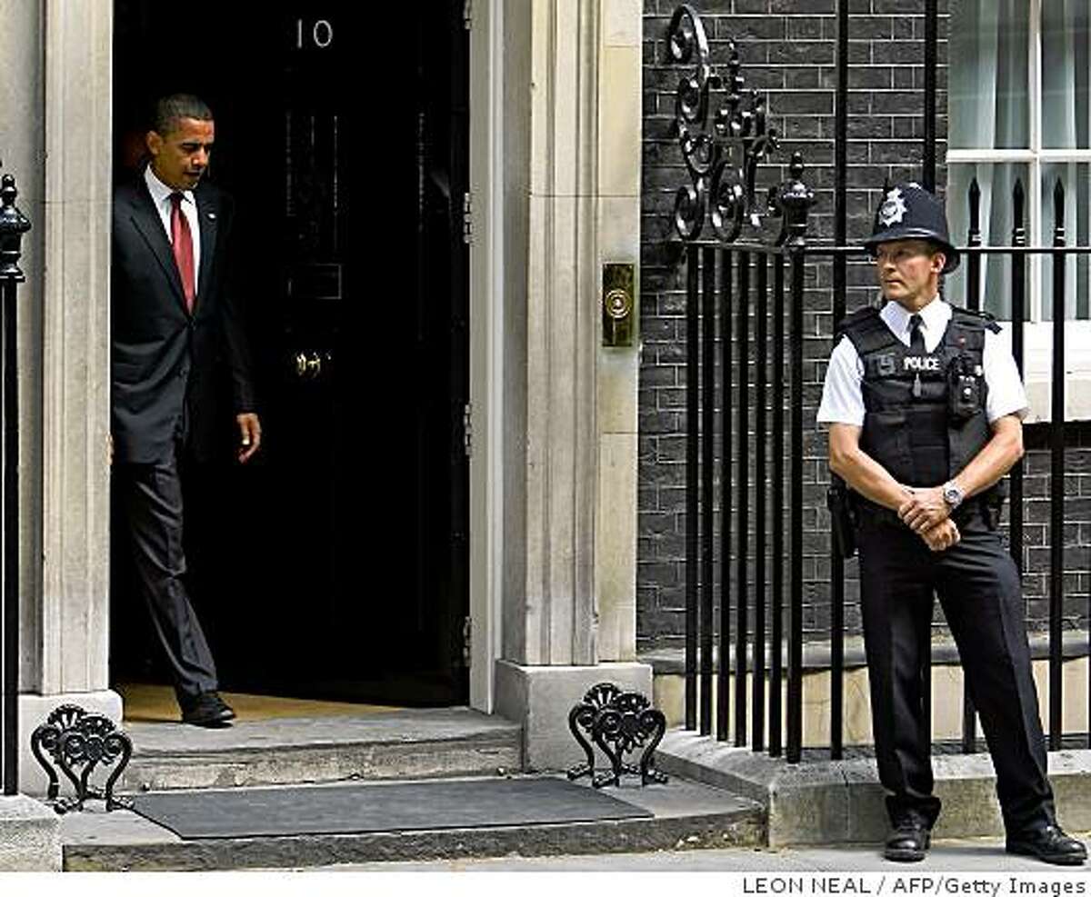 US Democratic presidential candidate Barack Obama leaves Number 10 Downing Street in London following a meeting with British Prime Minister Gordon Brown, on July 26, 2008. Obama met Brown on the last stop of an international tour with the focus on key foreign policy issues facing both countries, particularly Iraq and Afghanistan. AFP PHOTO/LEON NEAL (Photo credit should read Leon Neal/AFP/Getty Images)