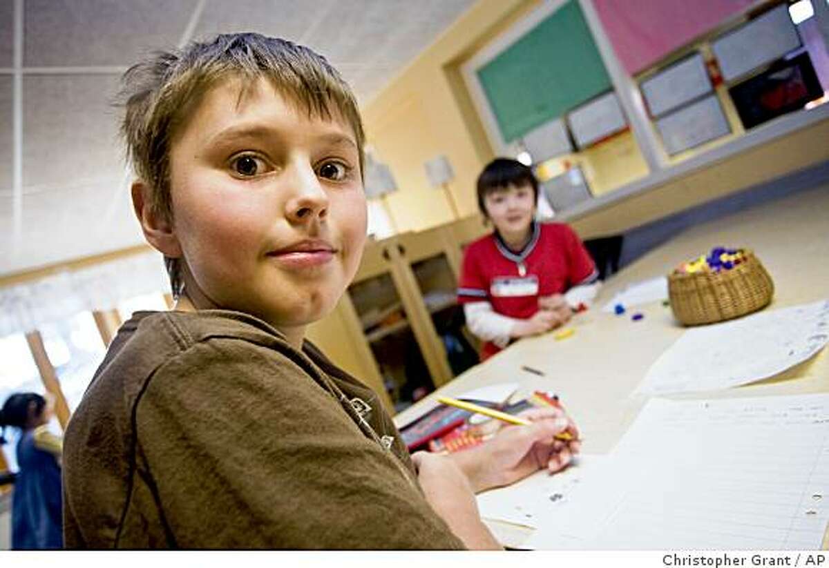 ** ADVANCE FOR SUNDAY, JULY 27 ** A student is shown working on an assignment at the Vittra school in Sollentuna, Sweden, on Wednesday April 30, 2008. It may sound out of place in Sweden, that paragon of taxpayer-funded cradle-to-grave welfare. But school choice has survived the critics and 16 years later it is spreading and attracting interest abroad. Since the change was introduced in 1992 by a center-right government that briefly replaced the long-governing Social Democrats, the numbers have shot up. In 1992, 1.7 percent of high schoolers and 1 percent of elementary schoolchildren were privately educated. Now the figures are 17 percent and 9 percent. (AP Photo/Christopher Grant)