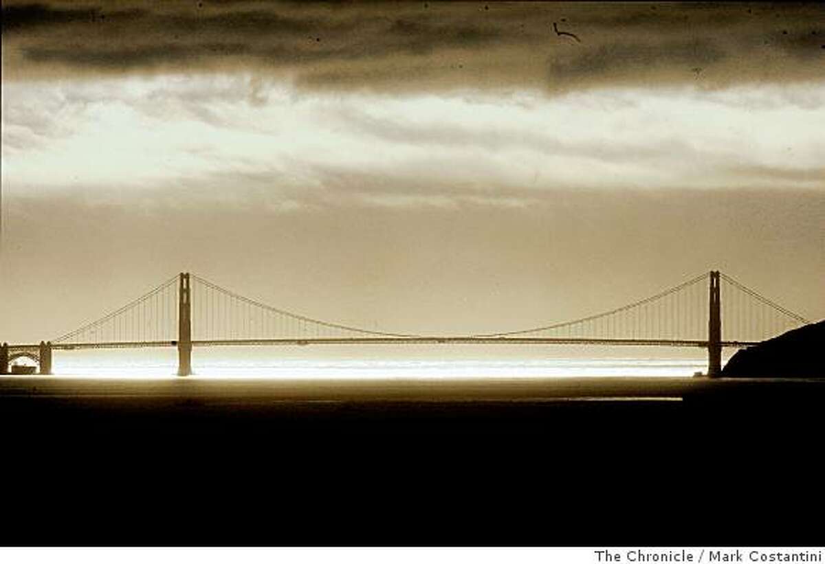 A storm is expected to hit the Bay Area this weekend and storm clouds are already gathering over the Golden Gate Bridge on February 21, 2008, as seen from this view from the El Cerrito hills. Photo Mark Costantini / The San Francisco Chronicle.