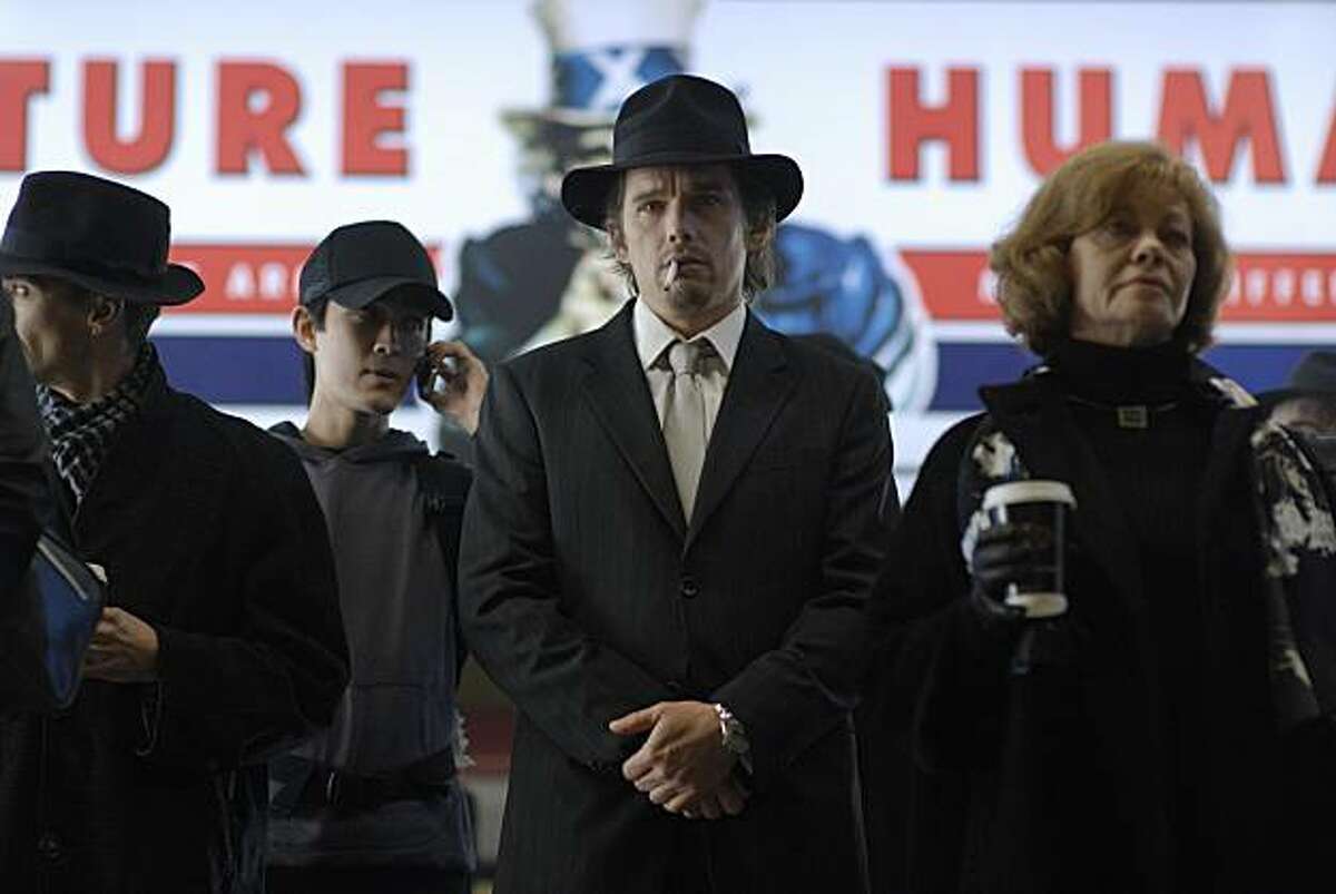 In this film publicity image released by Lionsgate, Ethan Hawke, center, is shown in a scene from, "Daybreakers." (AP Photo/Lionsgate, Ben Rothstein)