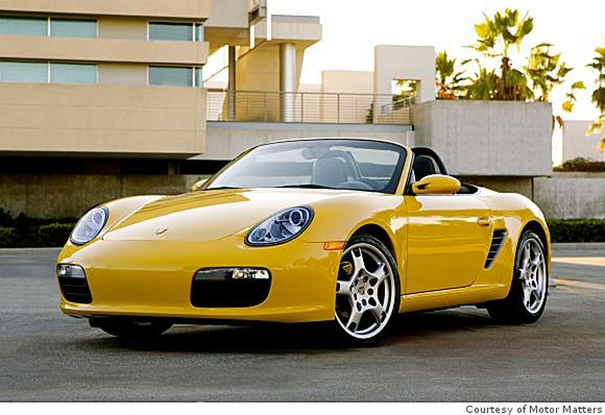 An open-top Porsche Boxster is the essence of summertime cruising