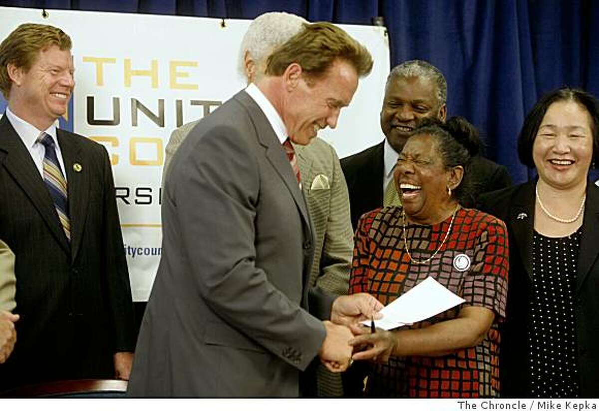 After Governor Arnold Schwarzenegger signed a foreclosure bill called SB1137, her greats Dorothy Hicks of Oakland r at The Unity Council building on Tuesday July 8, 2008 in Oakland, Calif. Hicks who's home was in foreclosure over a year ago pleaded her case in front of the state senate in Sacramento which kick started Perata's foreclosure bill.Photo by Mike Kepka / The Chronicle