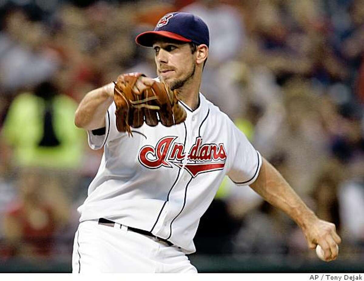 Cleveland Indians' Cliff Lee pitches to San Francisco Giants' Jose Castillo in the first inning of a baseball game, Thursday, June 26, 2008, in Cleveland. (AP Photo/Tony Dejak)