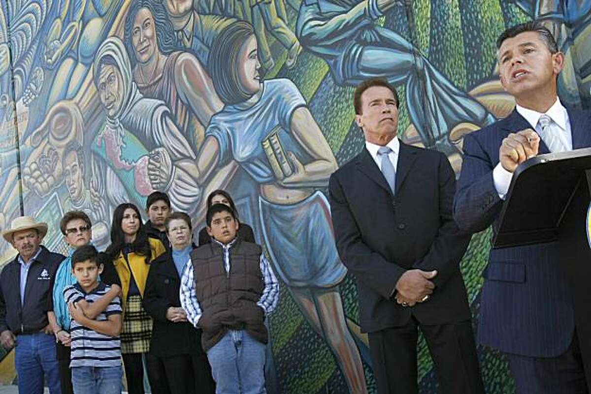 Sen. Abel Maldonado, right, speaks as Gov. Arnold Schwarzenegger, second from right, announces the appointment of Maldonado as lieutenant governor at Ruben Salazar Park in East Los Angeles, Tuesday, Nov. 24, 2009. Moldonado's family including his parents, wife , four children and other relatives listen at left.