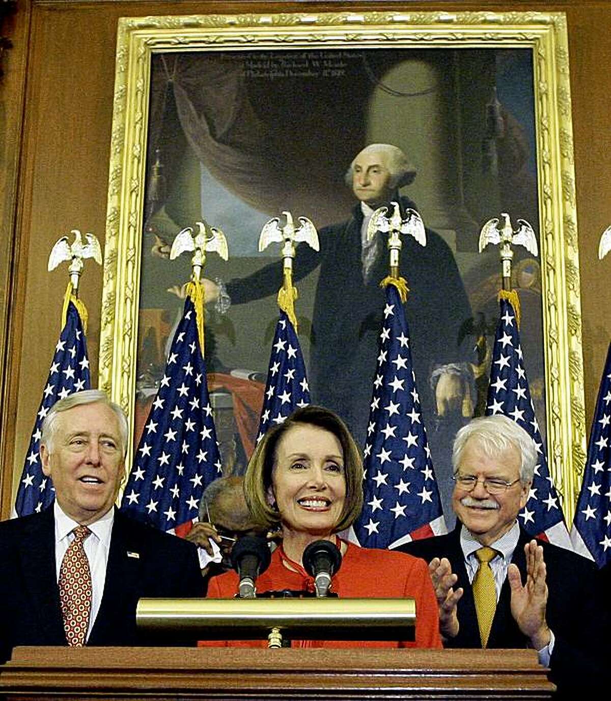 Speaker Nancy Pelosi, center, is joined by (L-R) House Majority Leader Steny Hoyer and Rep. George Miller, D-Calif. during a press conference at the U.S. Capitol, Saturday, Nov. 7, 2009 in Washington after the passage in the house of the health care reform bill. at the U.S. Capitol, Saturday, Nov. 7, 2009 in Washington. (AP Photo/Alex Brandon)
