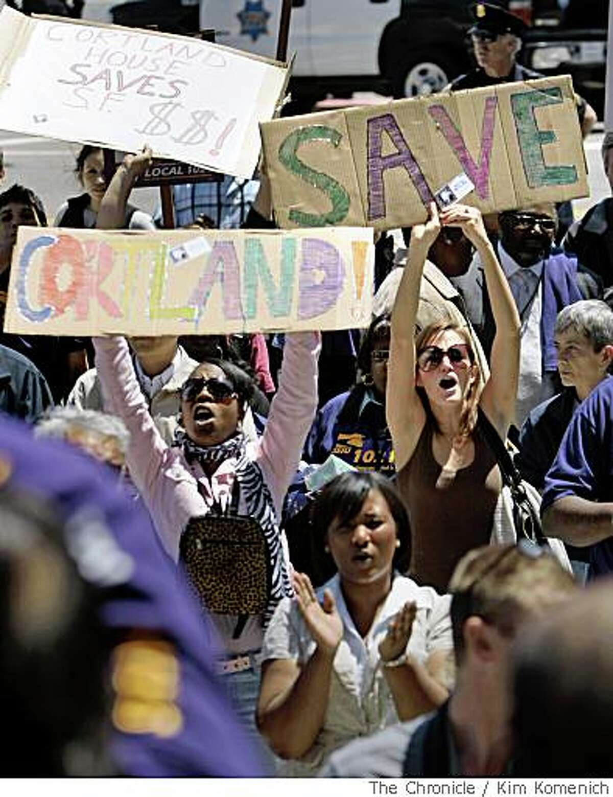 Antionette Jones, left and Shannon Tilston hold signs supporting Cortland House as members of Service Employees International Union Local 1021 hold a rally at San Francisco City Hall on Thursday, May 22, 2008.Photo by Kim Komenich / San Francisco Chronicle