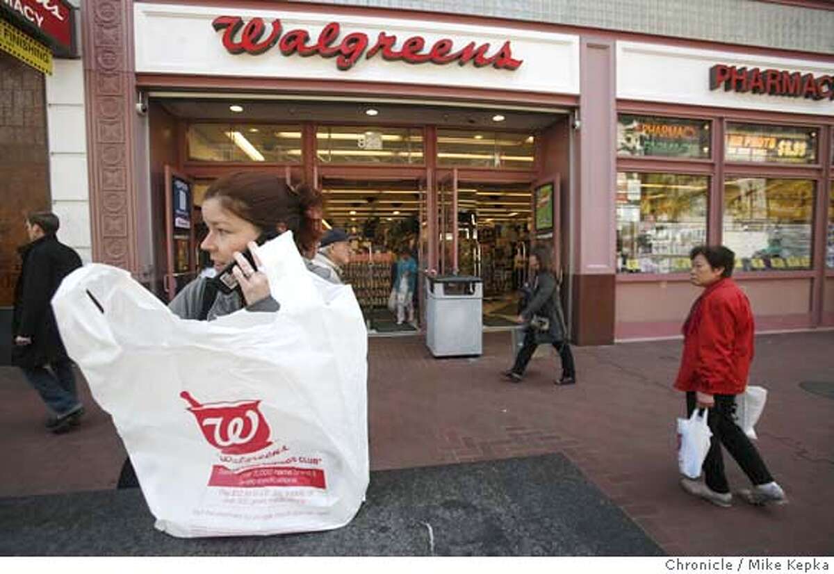 ###Live Caption:Anna Sager of San Francisco, Calif. holds newly purchased goods in a new degradable (not necessarily biodegradable) Walgreens bag in front of the 850 Market Street store on Monday May 19, 2008 in San Francisco, Calif. The store is in the process of phasing out non-degradable plastic bags in preparation for the city-wide ban on them starting May 20, 2008. Photo by Mike Kepka / San Francisco Chronicle###Caption History:Anna Sager of San Francisco, Calif. holds newly purchased goods in a new degradable (not necessarily biodegradable) Walgreens bag in front of the 850 Market Street store on Monday May 19, 2008 in San Francisco, Calif. The store is in the process of phasing out non-degradable plastic bags in preparation for the city-wide ban on them starting May 20, 2008. Photo by Mike Kepka / San Francisco Chronicle###Notes:(cq)###Special Instructions:MANDATORY CREDIT FOR PHOTOG AND SAN FRANCISCO CHRONICLE/NO SALES-MAGS OUT