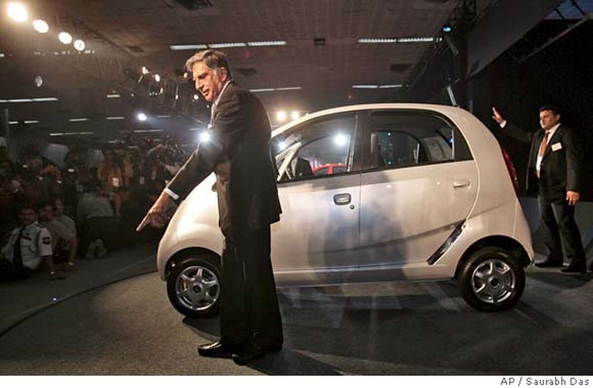 ###Live Caption:Tata Company Chairman Ratan Tata gestures during the launch of Tata Nano at the 9th Auto Expo in New Delhi, India, Thursday, Jan. 10, 2008. India's Tata Motors on Thursday unveiled its much anticipated US$2,500 car, an ultracheap price tag that suddenly brings car ownership into the reach of tens of millions of people across the world. (AP Photo/Saurabh Das)###Caption History:Tata Company Chairman Ratan Tata gestures during the launch of Tata Nano at the 9th Auto Expo in New Delhi, India, Thursday, Jan. 10, 2008. India's Tata Motors on Thursday unveiled its much anticipated US$2,500 car, an ultracheap price tag that suddenly brings car ownership into the reach of tens of millions of people across the world. (AP Photo/Saurabh Das)###Notes:Ratan Tata###Special Instructions: