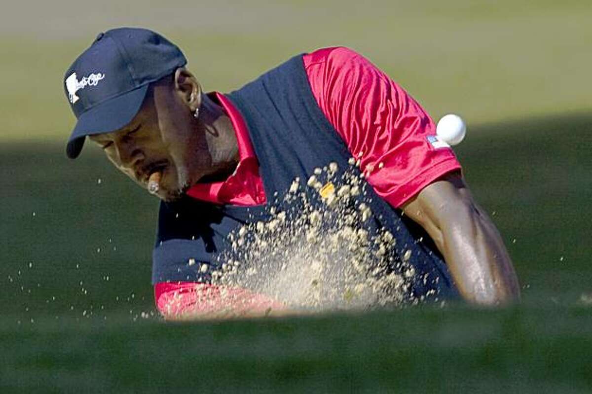 Michael Jordan hits out of the sand trap on the 16th hole at Harding Park Golf Course October 5, 2009 in San Francisco, Calif. (Photograph by David Paul Morris / Special to the Chronicle)