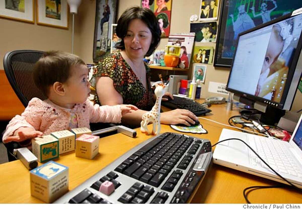 ###Live Caption:Mena Trott works at her office with her six-month-old daughter Penelope in San Francisco, Calif., on Friday, April 25, 2008. Trott created a blog to chronicle her pregnancy and Penelope's birth so friends and family could get immediate updates. Photo by Paul Chinn / San Francisco Chronicle###Caption History:Mena Trott works at her office with her six-month-old daughter Penelope in San Francisco, Calif., on Friday, April 25, 2008. Trott created a blog to chronicle her pregnancy and Penelope's birth so friends and family could get immediate updates. Photo by Paul Chinn / San Francisco Chronicle###Notes:Mena Trott, Penelope###Special Instructions:MANDATORY CREDIT FOR PHOTOGRAPHER AND S.F. CHRONICLE/NO SALES - MAGS OUT