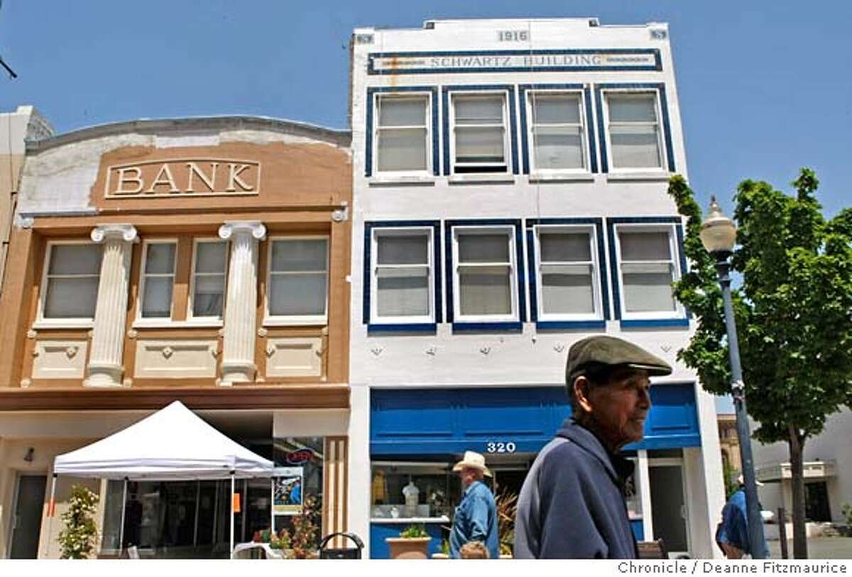 ###Live Caption:People walk past old buildings on Georgia Street as the Farmers Market winds down on May 10, 2008. The city of Vallejo, Calif. filed for bankrupcy this week. Photo by Deanne Fitzmaurice / San Francisco Chronicle###Caption History:People walk past old buildings on Georgia Street as the Farmers Market winds down on May 10, 2008. The city of Vallejo, Calif. filed for bankrupcy this week. Photo by Deanne Fitzmaurice / San Francisco Chronicle###Notes:###Special Instructions:MANDATORY CREDIT FOR PHOTOG AND SAN FRANCISCO CHRONICLE/NO SALES-MAGS OUT