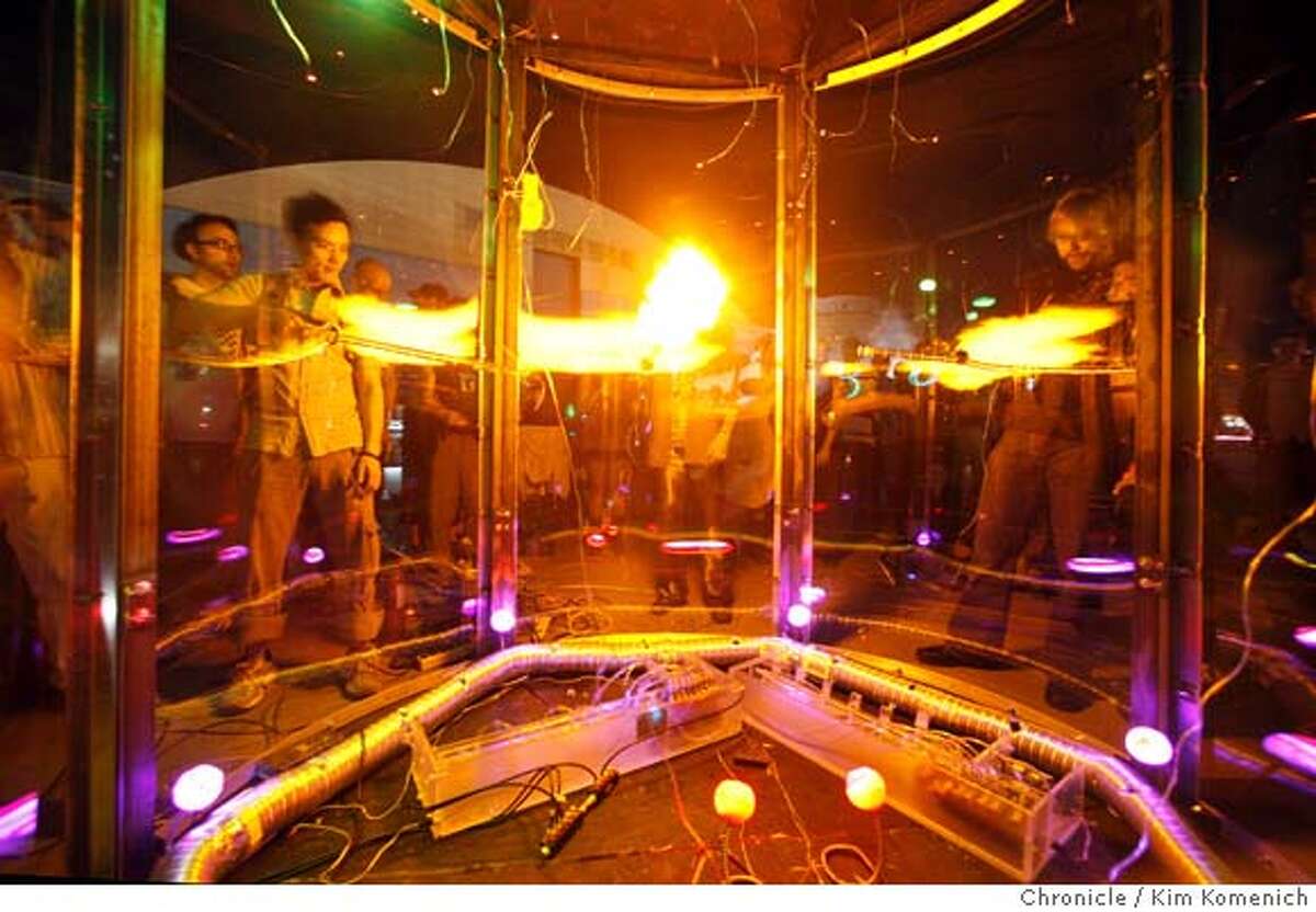 Festivalgoers play with an interactive "Hydrogen Chamber", designed by Brett Levine and his associates, on Saturday, April 12, 2008 during Yuri's Night" at NASA Ames Research Center at Moffett FIeld, Calif. Photo by Kim Komenich / San Francisco Chronicle