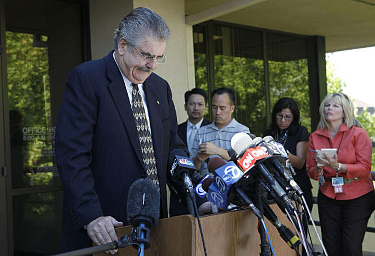 Conta Costa County Sheriff Warren E. Rupf, left, speaks at a news conference discussing contact the Sheriff's Office had with kidnap suspect Phillip Garrido in 2006 on Tuesday, Aug. 28, 2009, in Martinez, Calif. A woman who was snatched from a bus stop as an 11-year-old child in 1991 turned up Thursday after being held for the past 18 years in isolation in a backyard compound by a convicted sex offender who fathered two children with her, police said. (AP Photo/Jeff Chiu)