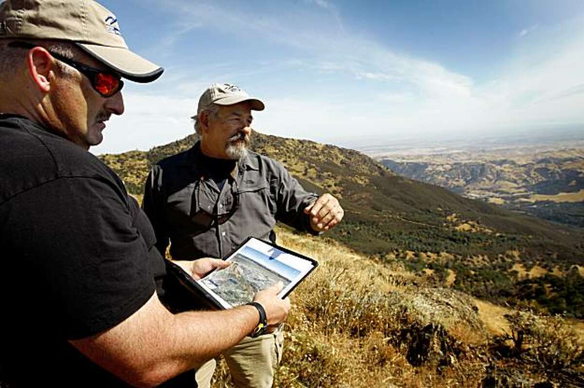 Save Mount Diablo's Seth Adams (left) and Ron Brown view the newly acquired Viera-North Peak parcel of land during a hike in Mount Diablo State Park, Calif., on Thursday, Sept. 10, 2009.