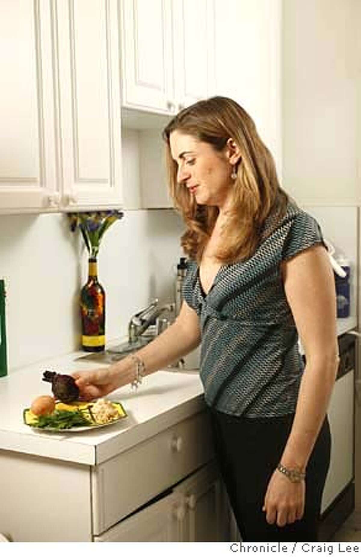 ###Live Caption:Rachelle Diamond, setting up her ritual Seder plate for Passover. She is a vegetarian, so she substitutes roasted beets for the lamb shankbone. Craig Lee / The Chronicle###Caption History:Rachelle Diamond, setting up her ritual Seder plate for Passover. She is a vegetarian, so she substitutes roasted beets for the lamb shankbone. Craig Lee / The Chronicle###Notes:Rachelle Diamond 415-606-5889 (cell) or 415-441-5889 Craig Lee 415-218-8597 clee@sfchronicle.com###Special Instructions:MANDATORY CREDIT FOR PHOTOG AND SF CHRONICLE/NO SALES-MAGS OUT